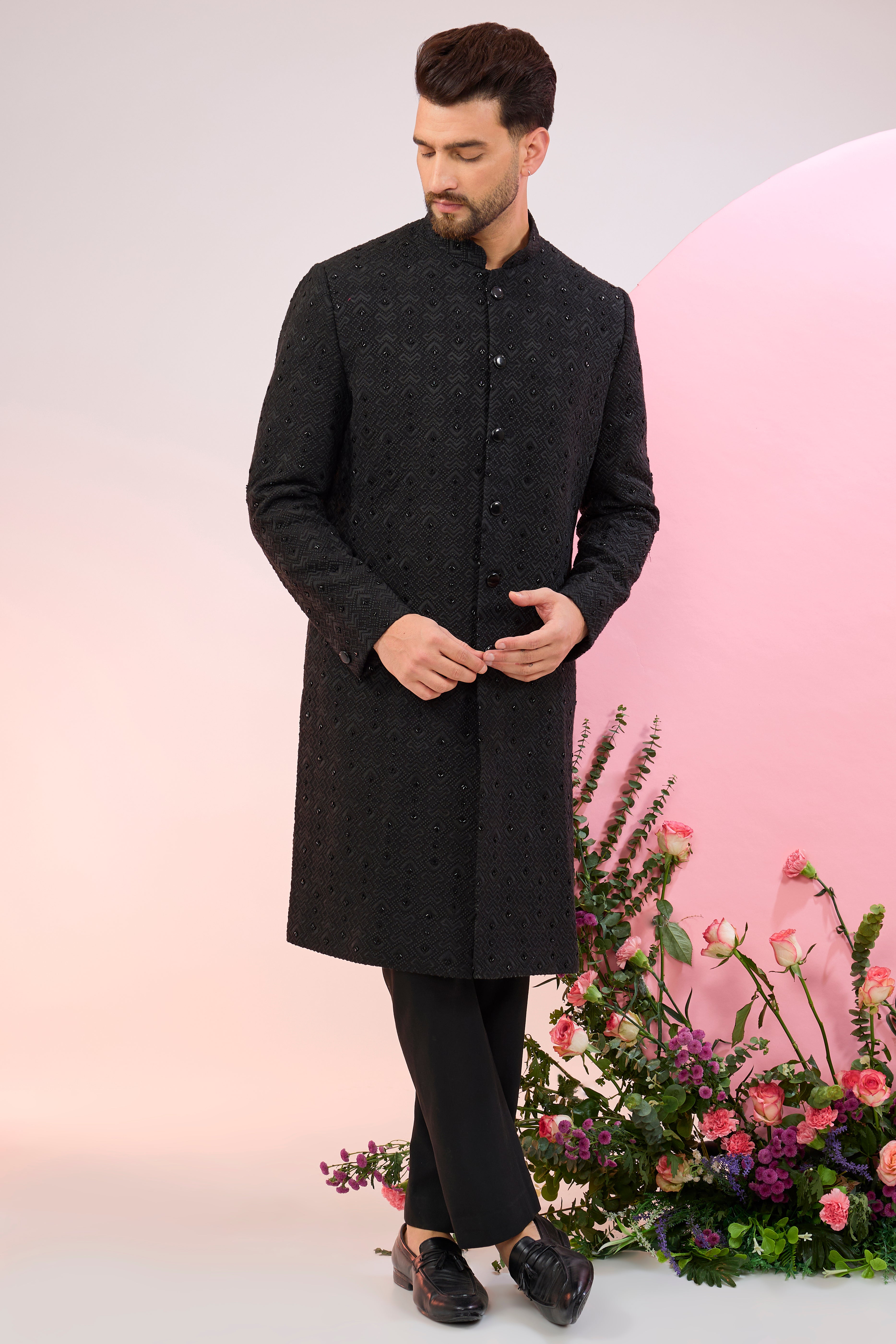 black geometrically embroidered sherwani with delicate cut dana work