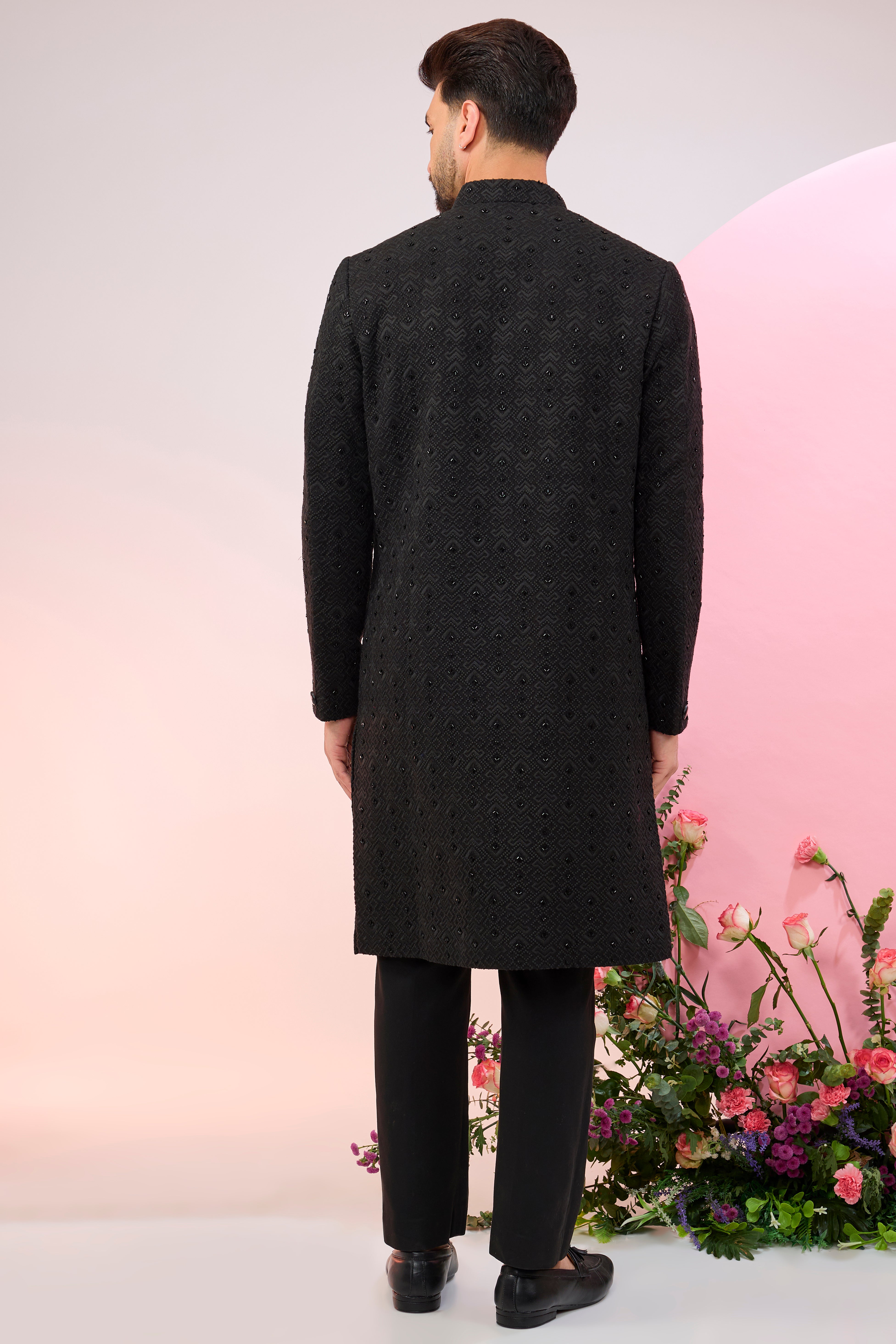 black geometrically embroidered sherwani with delicate cut dana work