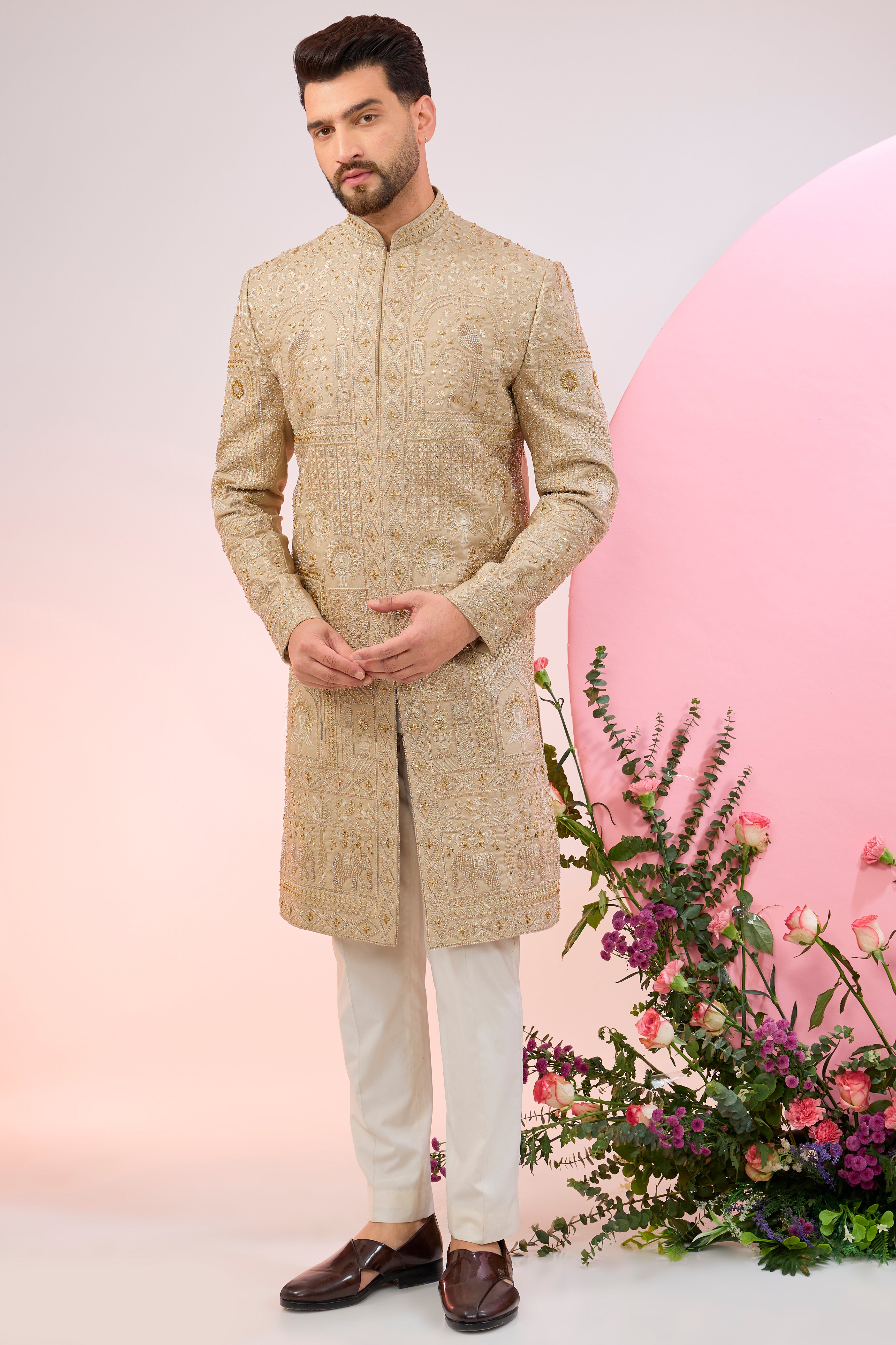 beige hand embroidered sherwani with intricate thread and cut dana embroidery