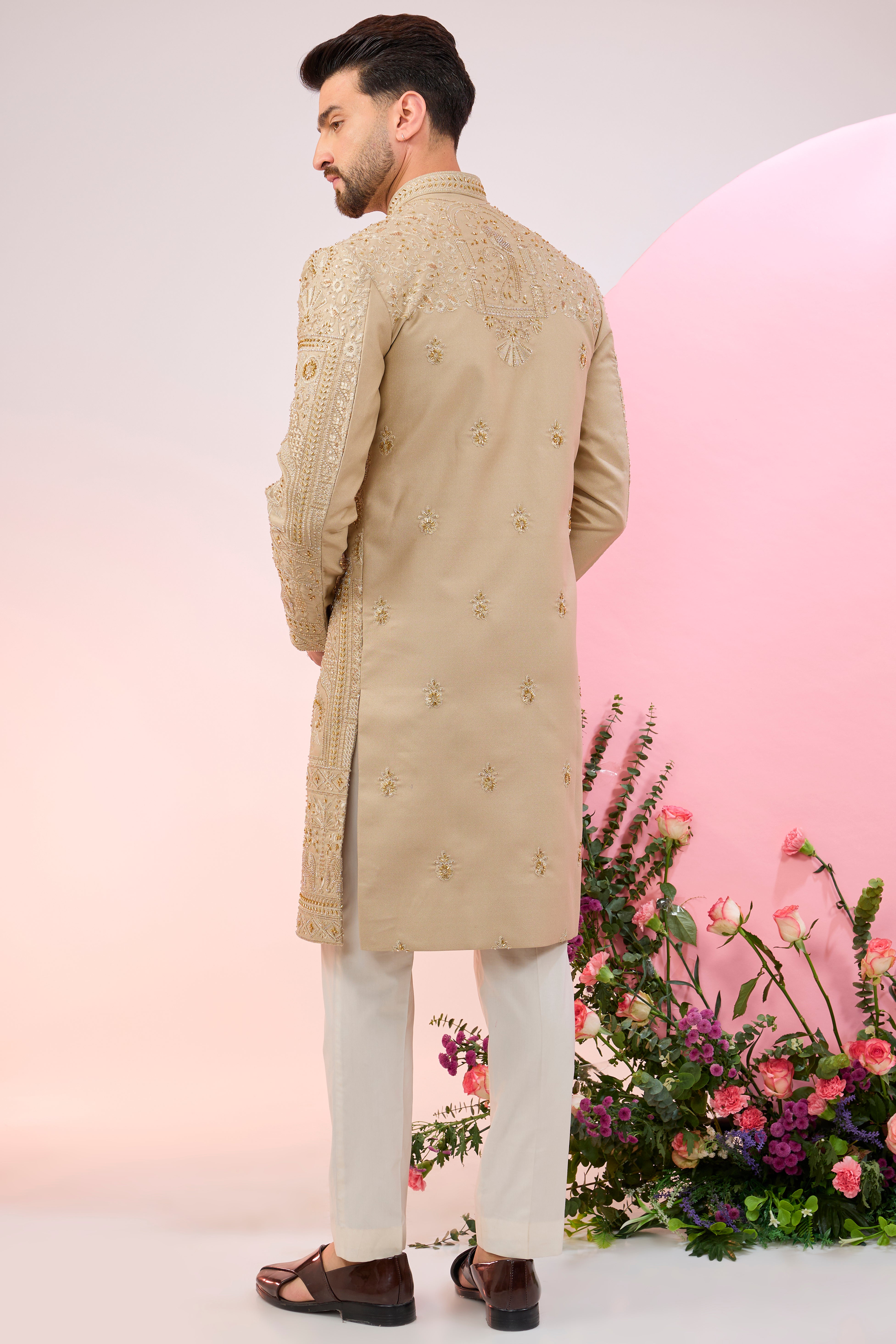 beige hand embroidered sherwani with intricate thread and cut dana embroidery