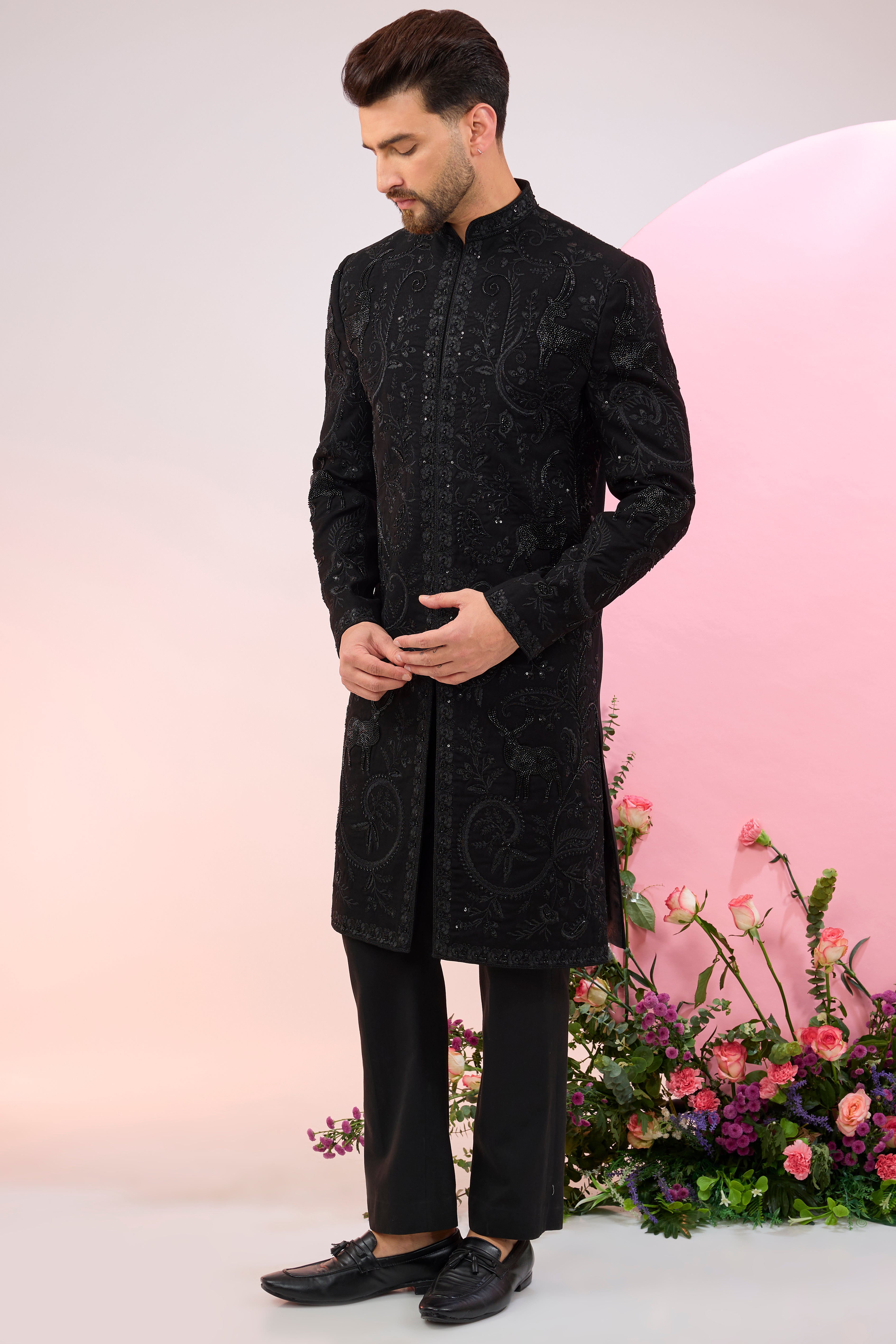 black hand embroidered cut dana sherwani with flora and fauna motifs