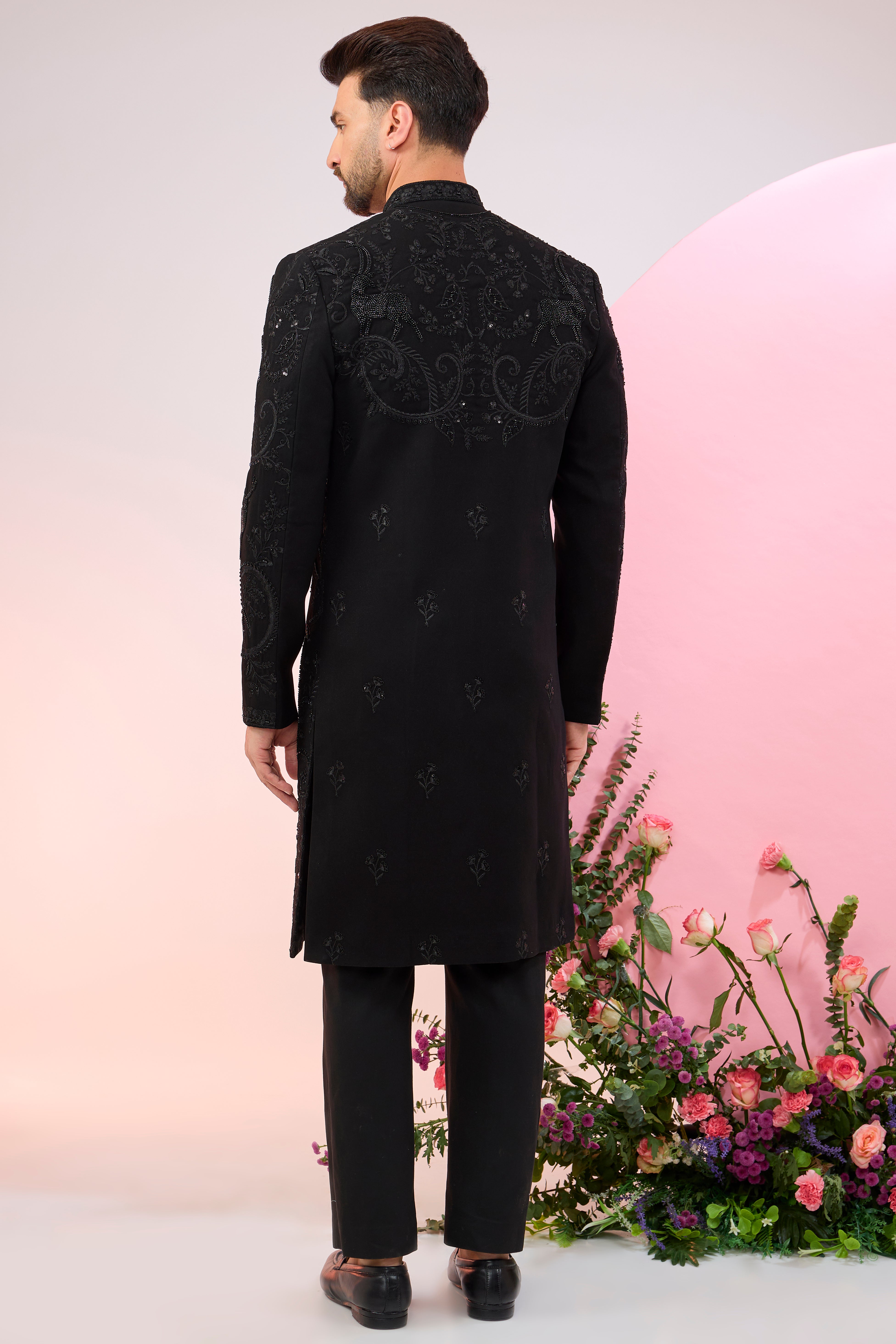 black hand embroidered cut dana sherwani with flora and fauna motifs