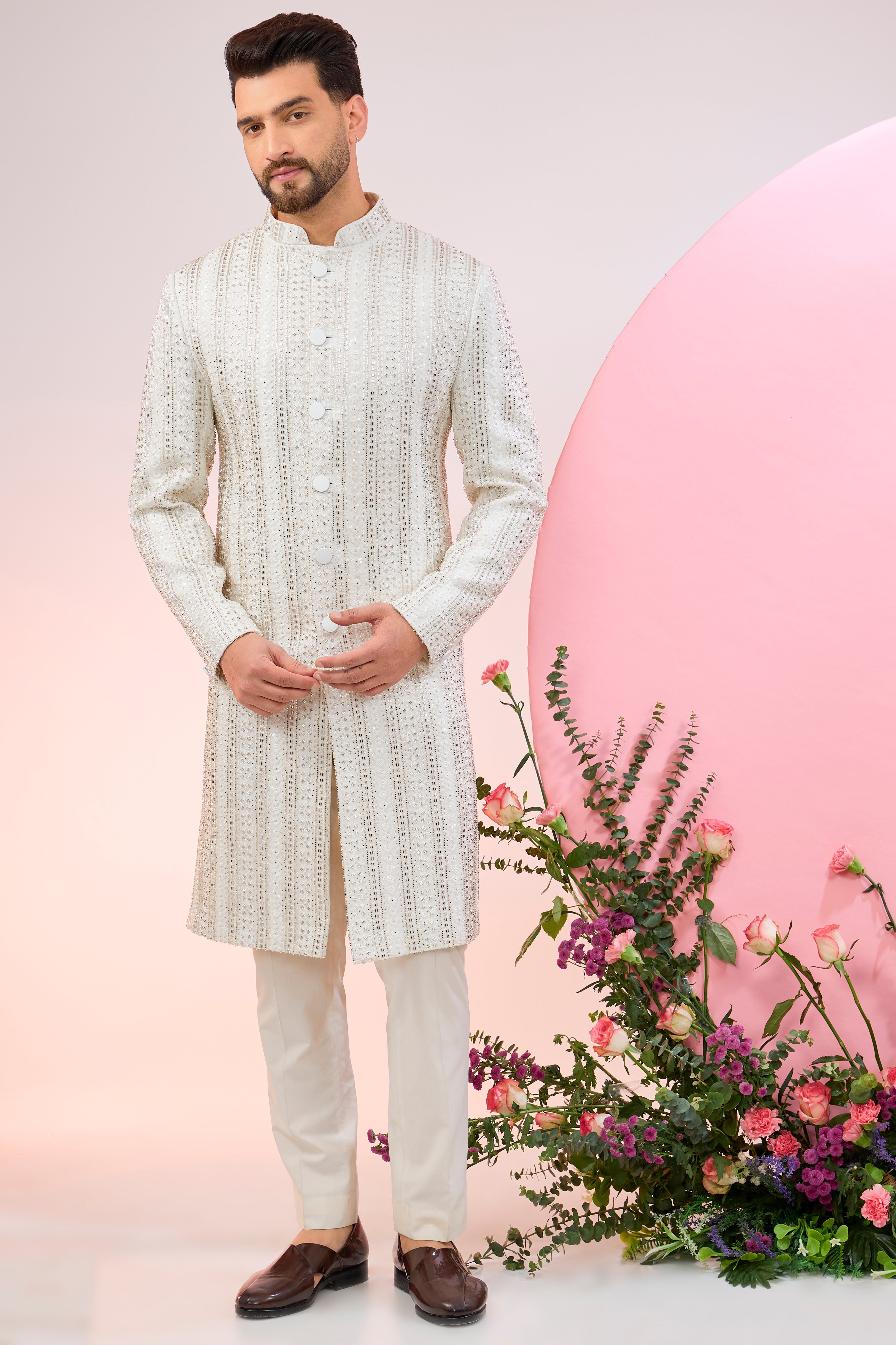 white sherwani with intricate cut dana embroidery